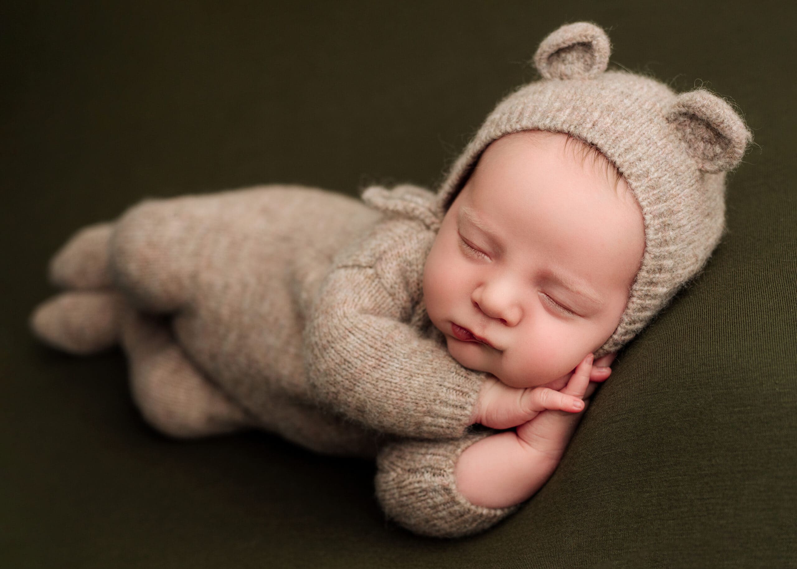 Medford, Oregon Newborn boy in a photographers studio.