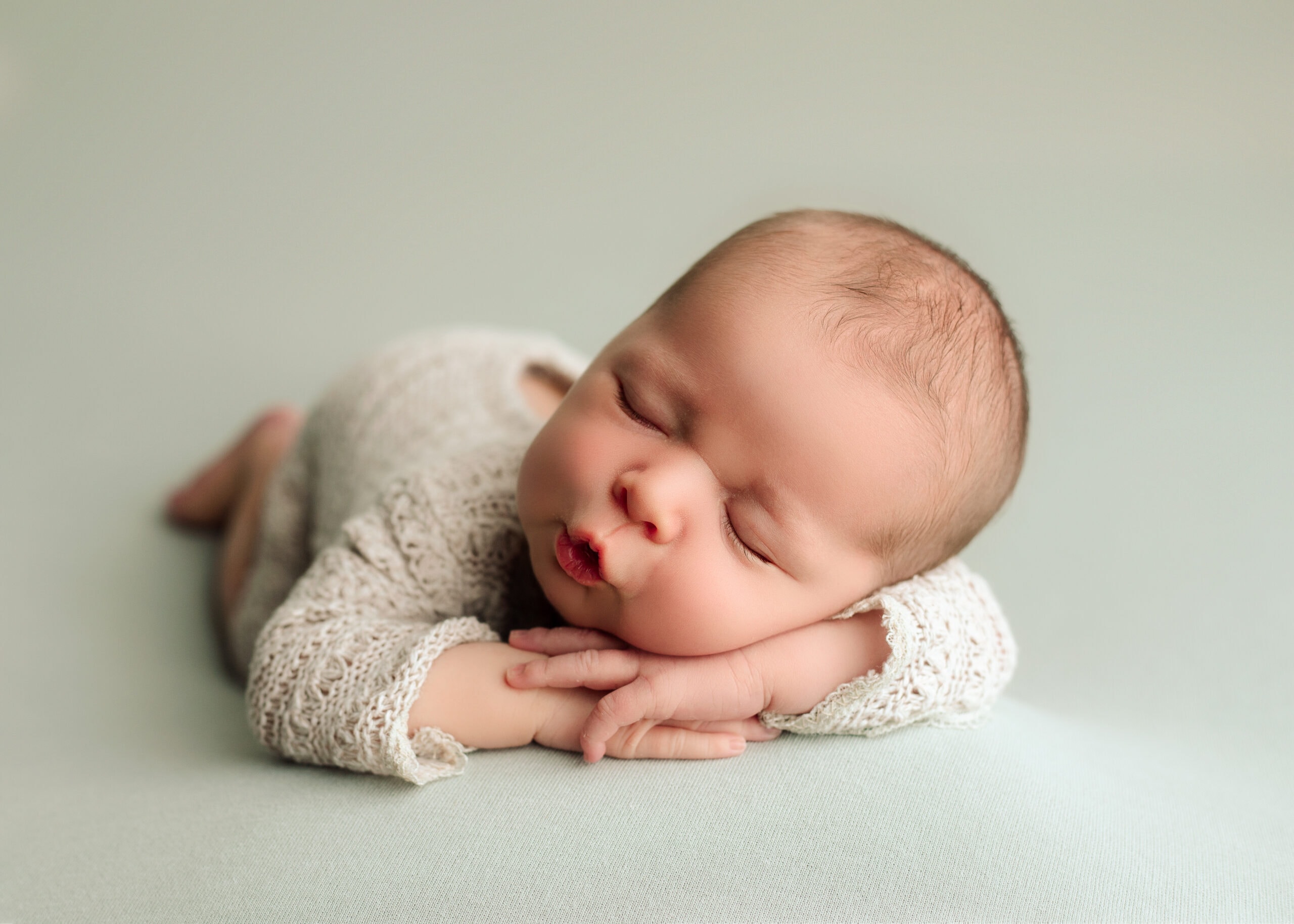 Southern Oregon Newborn boy in a photographers studio.