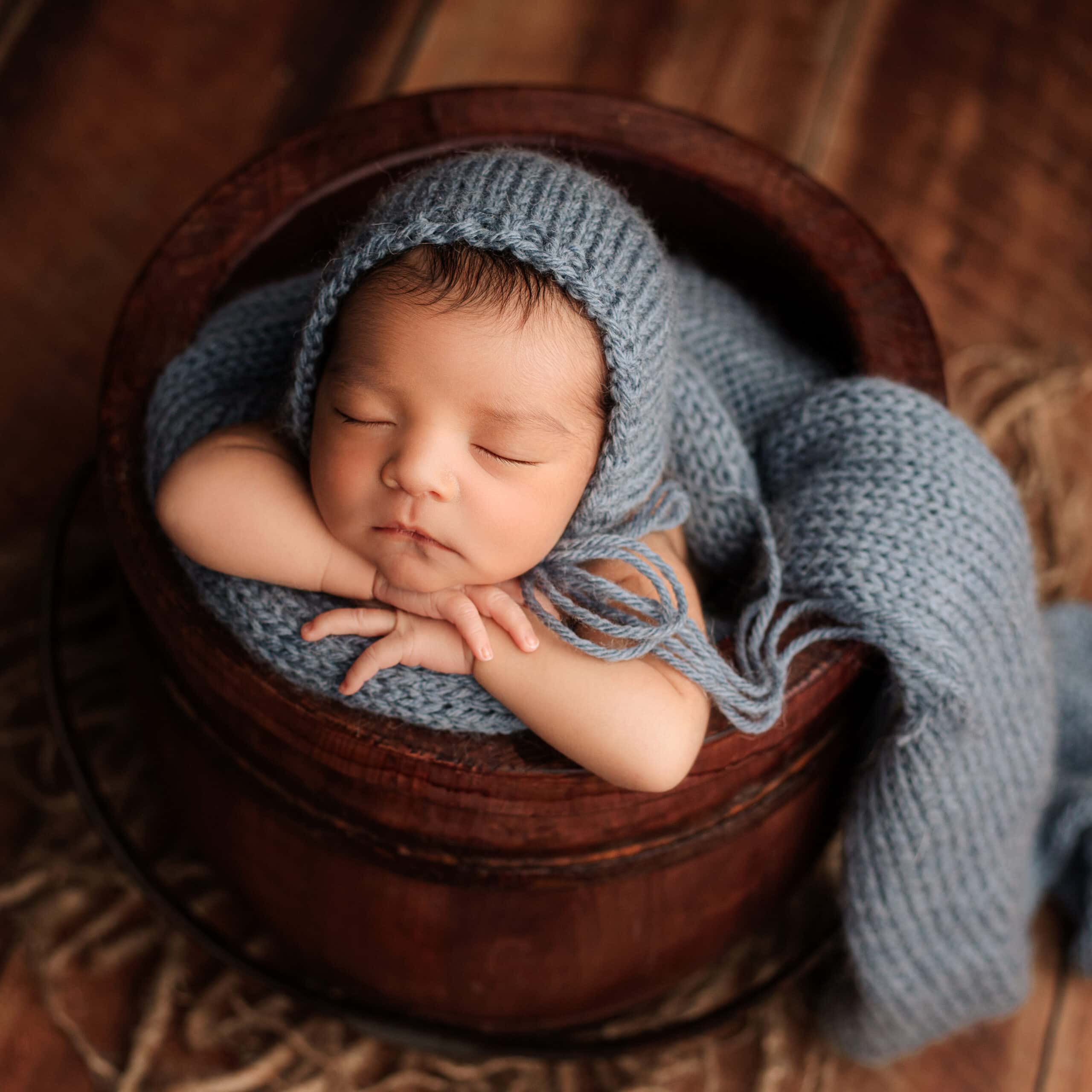 Newborn boy photographed in bucket, Grants Pass, Oregon.